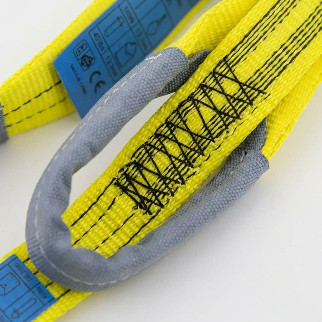 Yellow 3000kg duplex polyester webbing sling, 90mm wide, with grey reinforced becket eyes and CE certification label